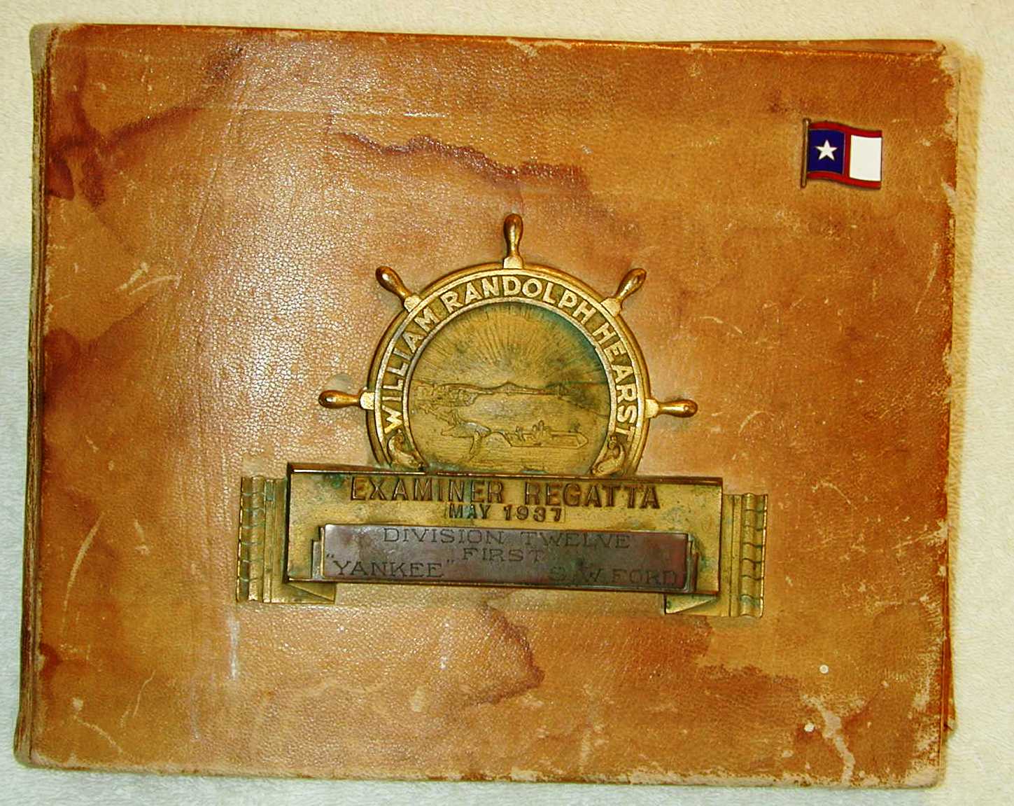 The cover of Yankee's ship's logbook, begun 1937