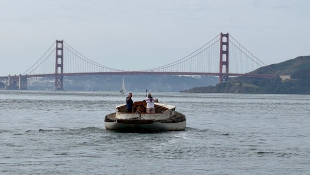 Yankee crossing San Francisco Bay with the Golden Gate Bridge behind her